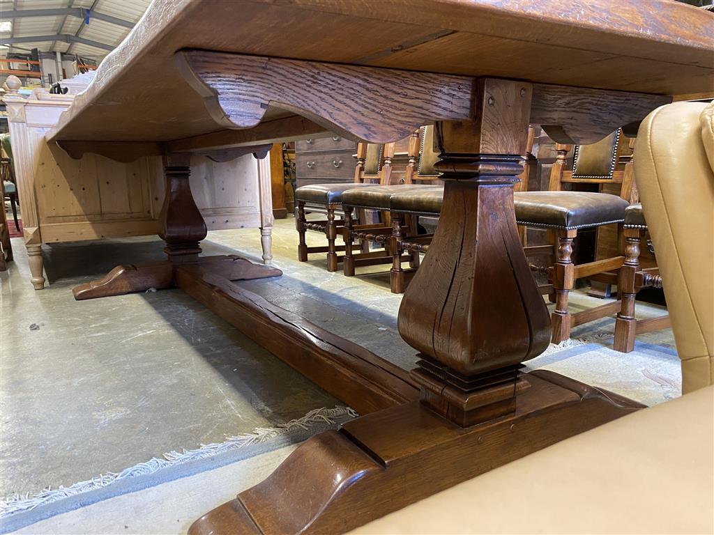 An 18th century style rectangular oak refectory dining table, length 274cm, depth 106cm, height 76cm